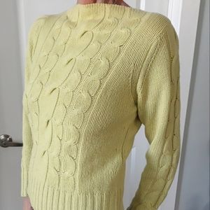 A vintage Neiman Marcus mint colored cashmere sweater